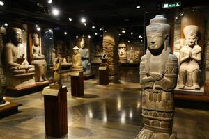 Ancient statues exhibition in a dimly lit museum gallery photo