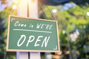 Come in We're OPEN. The business is open for normal service. photo