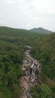 Aerial view of scenic jungle waterfall in the mountains of Chiang Mai, Thailand. video