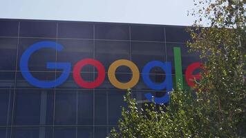 Close up of the Google logo sign on the building in Mountain View, California. Google LLC is an American multinational technology company. video