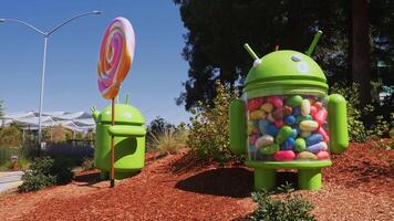Android Lollipop replica in front of Google office. It is a multinational company specializing in Internet related services and products. video