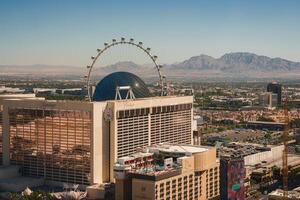 Daytime Las Vegas Strip View with High Roller Ferris Wheel, Modern Architecture photo