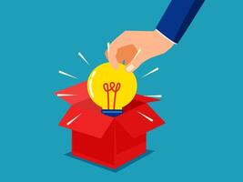 a hand is putting a light bulb into a box vector