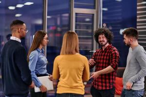 Multicultural Business Team Brainstorming During Coffee Break photo
