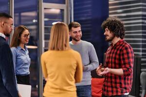 Multicultural Business Team Brainstorming During Coffee Break photo
