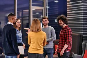 Multicultural Business Team Brainstorming During Coffee Break photo