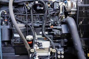 The powerful engine of a car. Internal design of engine. Car engine part. Modern powerful car engine. photo