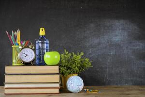 Education concept - books on the desk in the auditorium. photo