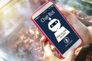 artificial intelligence,AI chat bot concept. Hands holding mobile phone. photo