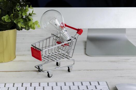 Leadership Initiative, Selling ideas, Have knowledge to share. The lamp is in the shopping cart. Have a computer as an image element. photo