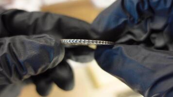 Collector examining Old Coin video