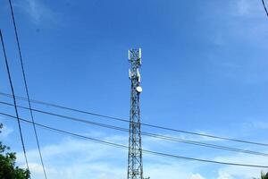 telephone signal catcher tower with a beautiful sky background photo