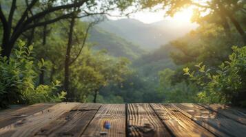 Wooden table in the garden on a background of green forest. photo