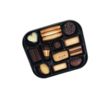 Sweet chocolate cookies assortment in open box top view isolated image, clipping path, soft focus png