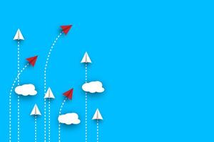 Group of white paper plane in one direction and one red paper plane pointing in different way on blue background. vector