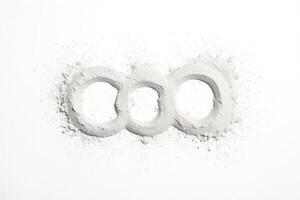 Three Circles of White Powder on a White Background photo