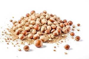 Hazelnuts with husks and shells on white background photo