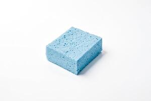 Blue Sponge Cube Isolated on White Background photo