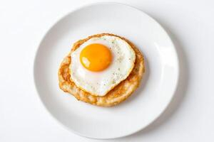 Fried Egg on a Round Crispy Flatbread photo