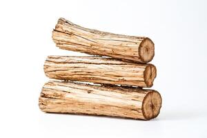 Stack of Tree Logs on White Background photo