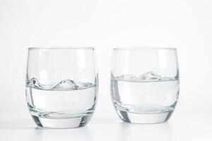 Two Glasses of Water on a White Background photo
