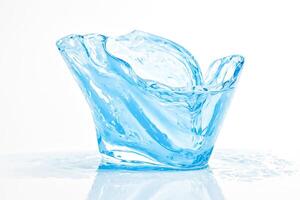 Splash of Water in a Glass on White Background photo