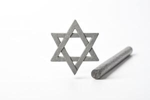 Star of David and a Cylinder on a White Background photo
