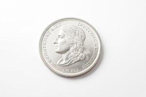 Silver coin with profile of a man photo