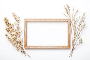 Rustic Frame with Dried Flowers on White Background photo
