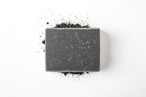 Black Charcoal Soap Bar with Scattered Particles photo