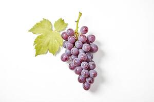 Close-up of a bunch of red grapes with a leaf photo