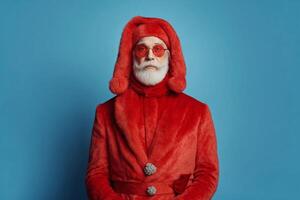 Senior Man in Red Fur Coat and Hat with Red Sunglasses photo