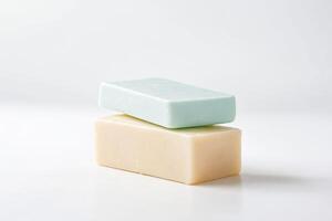 Stack of two bars of soap on a white background photo
