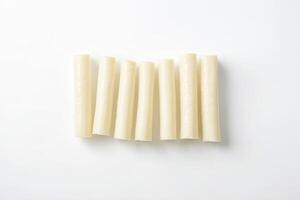 String Cheese Sticks on White Background photo