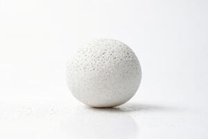 White Sphere with a Textured Surface on a White Background photo
