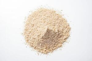 Close-up of a Heap of Rolled Oats on a White Surface photo