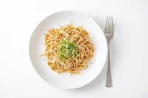 Close up of a plate of noodles with a fork photo