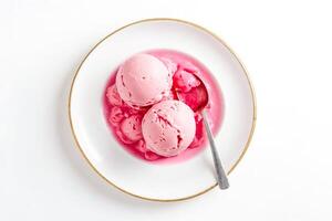 Pink Ice Cream With Sauce On A White Plate photo