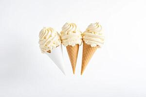 Three Vanilla Ice Cream Cones on White Background photo