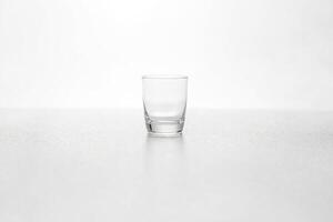 Empty Glass on White Background photo