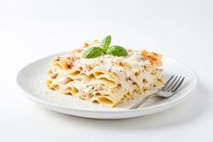 Close-up of a plate of lasagna with a fork photo