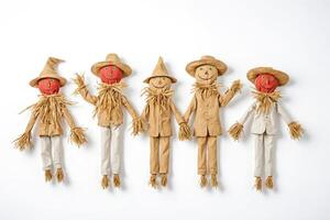 Five smiling scarecrows in a row photo