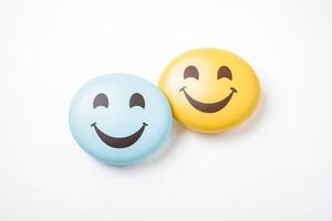 Two Smiling Emojis on White Background photo