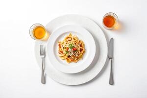 Pasta with Tomato Sauce and Parmesan Cheese on White Plate with Fork and Knife photo