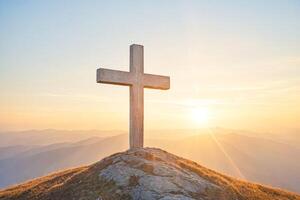 Cross on a Mountaintop at Sunset photo