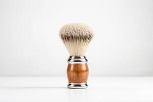 Shaving brush with wooden handle on white background photo