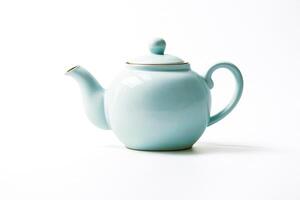 Blue Teapot on White Background photo