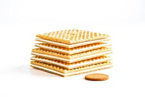 Stack of wafers with white filling isolated on white background photo