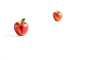 Two Red Apples on White Background photo