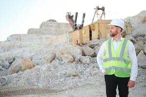 Quarry worker doing a quality check photo